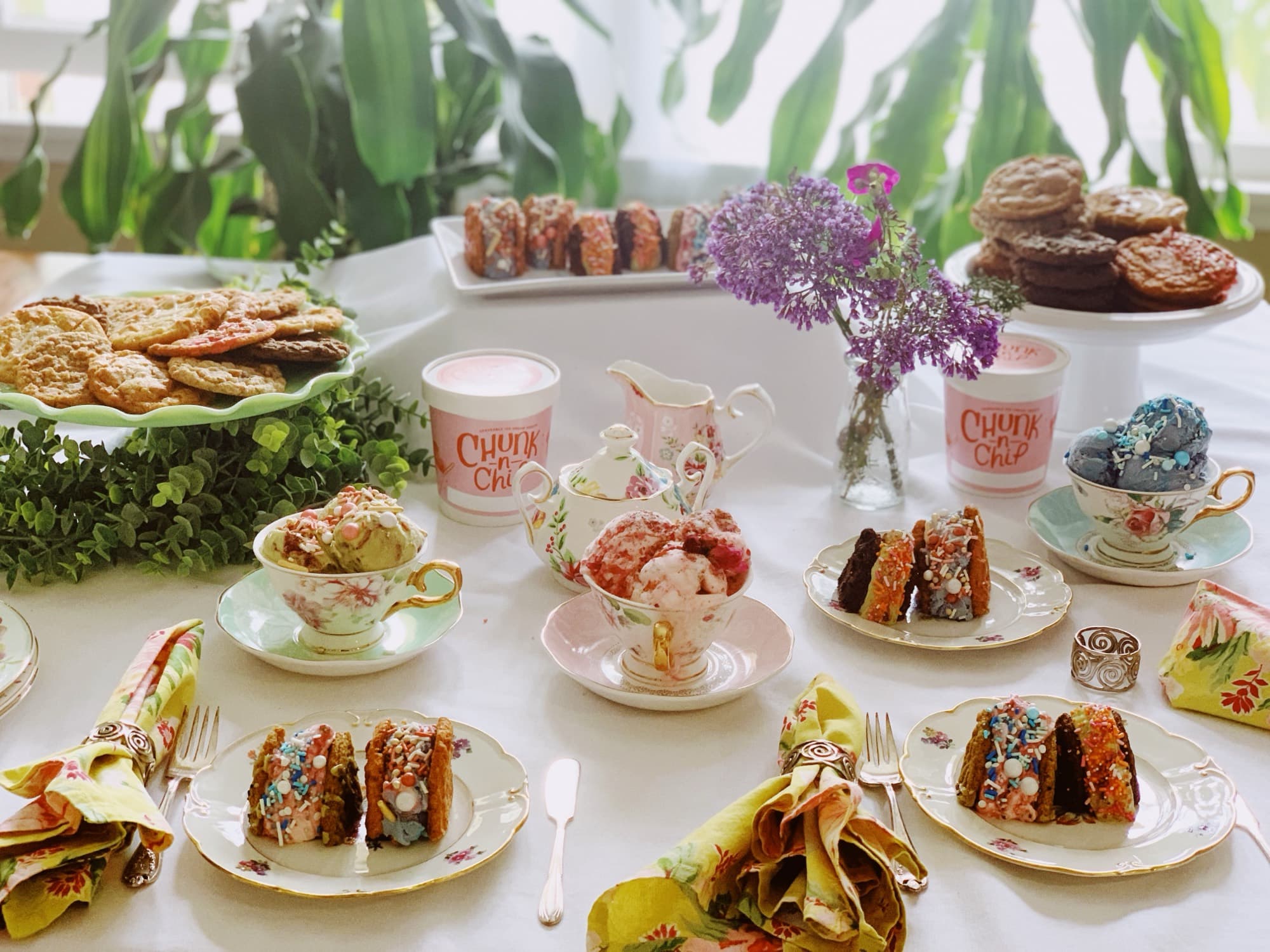 Tea party table set with Chunk-N-Chip cookies, ice cream sammiches, and branded pints
